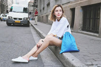 Blue drawstring bag.