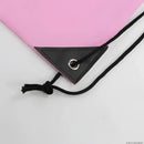Pink drawstring bag corner.