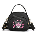 Black cartoon character handbag.