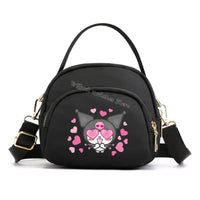 Black cartoon character handbag.