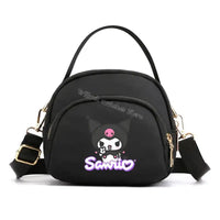Black cartoon character handbag.