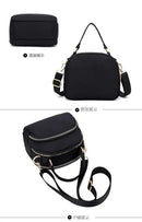Black nylon crossbody bag.