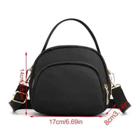 Black nylon crossbody bag with dimensions.