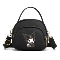 Black purse with cartoon character.