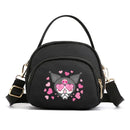 Black cartoon character handbag.