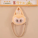 Plush bunny purse with shoulder strap.