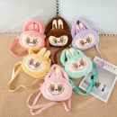 Colorful plush bunny purses.