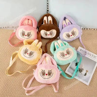 Colorful plush bunny purses.