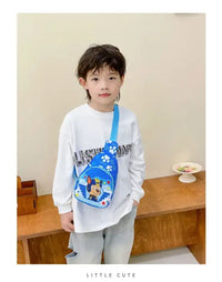 Child’s blue Paw Patrol sling bag.