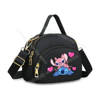 Black handbag with cartoon characters.