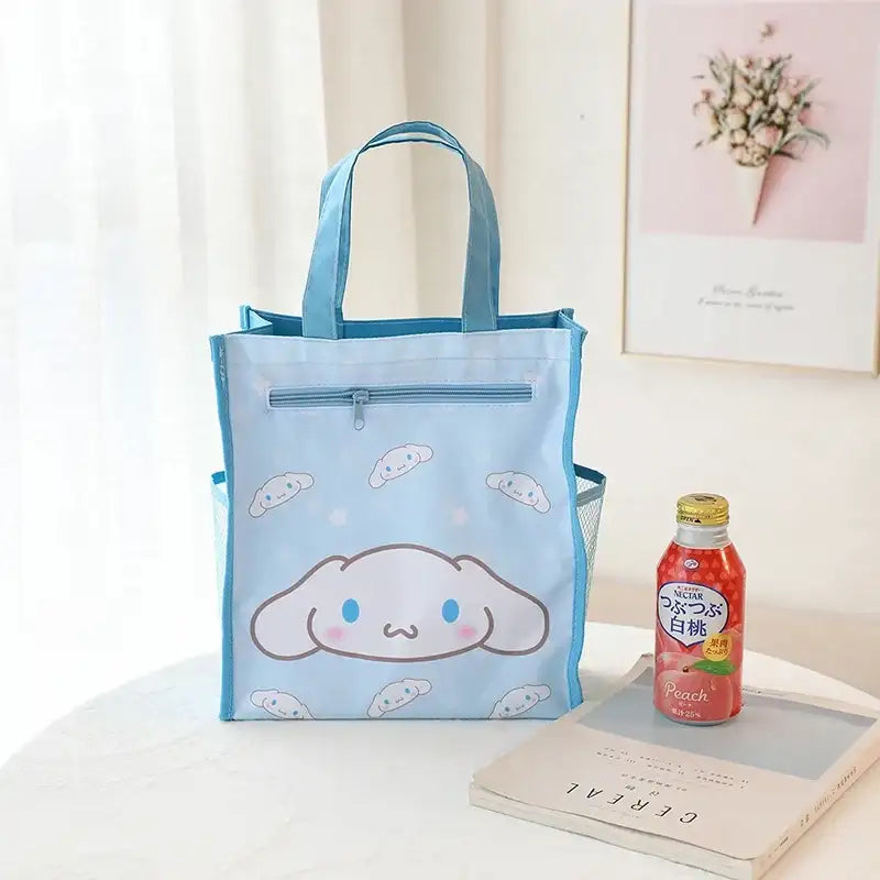 Light blue cartoon tote bag.