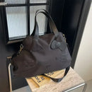 Black Hello Kitty tote bag.