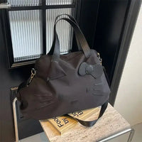 Black Hello Kitty tote bag.