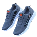 Gray knit running shoes with white soles.