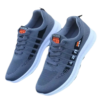 Gray knit running shoes with white soles.
