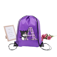 Purple drawstring bag with Kuromi character and letter A.