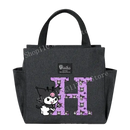 Gray lunch bag with cartoon character and letter.