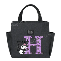 Gray lunch bag with cartoon character and letter.