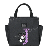 Gray tote bag with cartoon character.