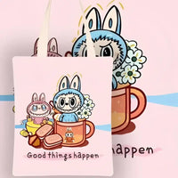 Pink tote bag with cartoon bunny design.