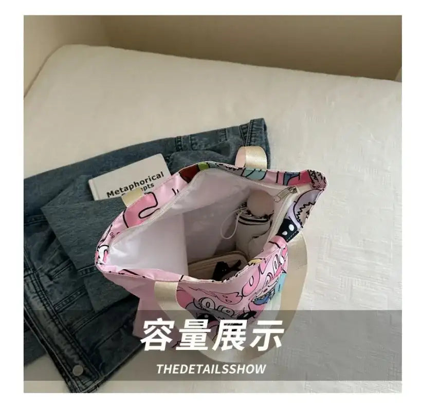 Open pink patterned tote bag.