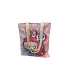 Pink tote bag with cartoon character.