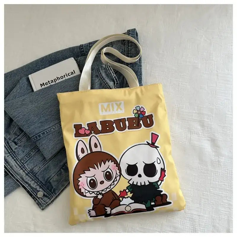 Yellow tote bag with cartoon characters.