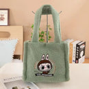 Green fuzzy cartoon tote bag.