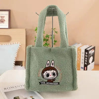 Green fuzzy cartoon tote bag.
