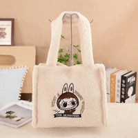 Fuzzy white cartoon-embroidered tote bag.
