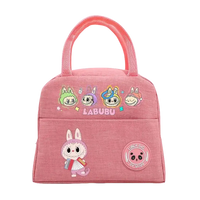 Pink cartoon lunch bag.