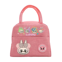 Pink cartoon lunch bag.