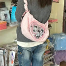 Pink heart-shaped ita bag.