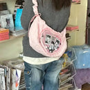 Pink heart-shaped ita bag.