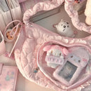 Pink quilted heart-windowed bag.