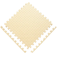 Beige interlocking foam floor tiles.