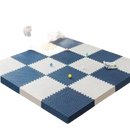 Checkered beige and navy foam play mat.