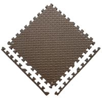 Brown interlocking foam floor tiles.