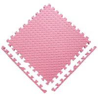 Pink interlocking foam floor tile.