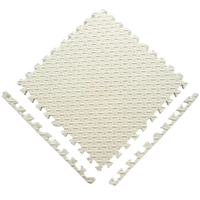 White interlocking foam floor tiles.