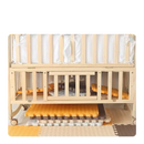 Wooden baby crib with storage.