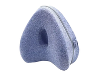 Blue memory foam knee pillow.