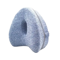 Blue memory foam knee pillow.