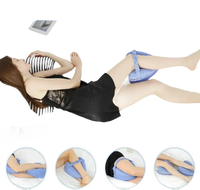 Blue knee pillow with strap.