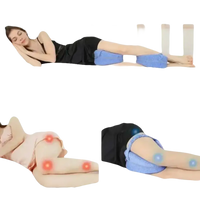 Blue orthopedic leg pillow.