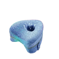Ergonomic knee pillow with hollowed-out design.