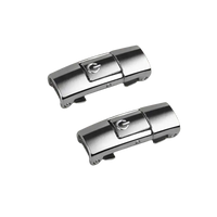 Two silver magnetic press locks.