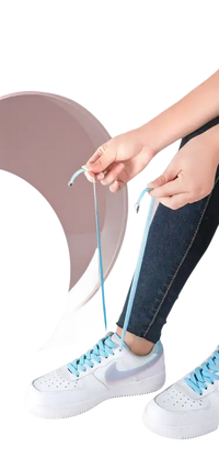 White sneakers with light blue laces.