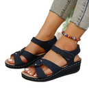 Navy blue wedge sandals.