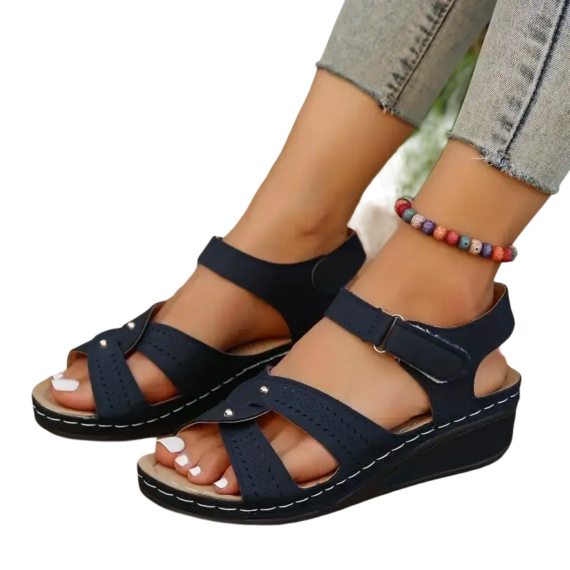 Navy blue wedge sandals.